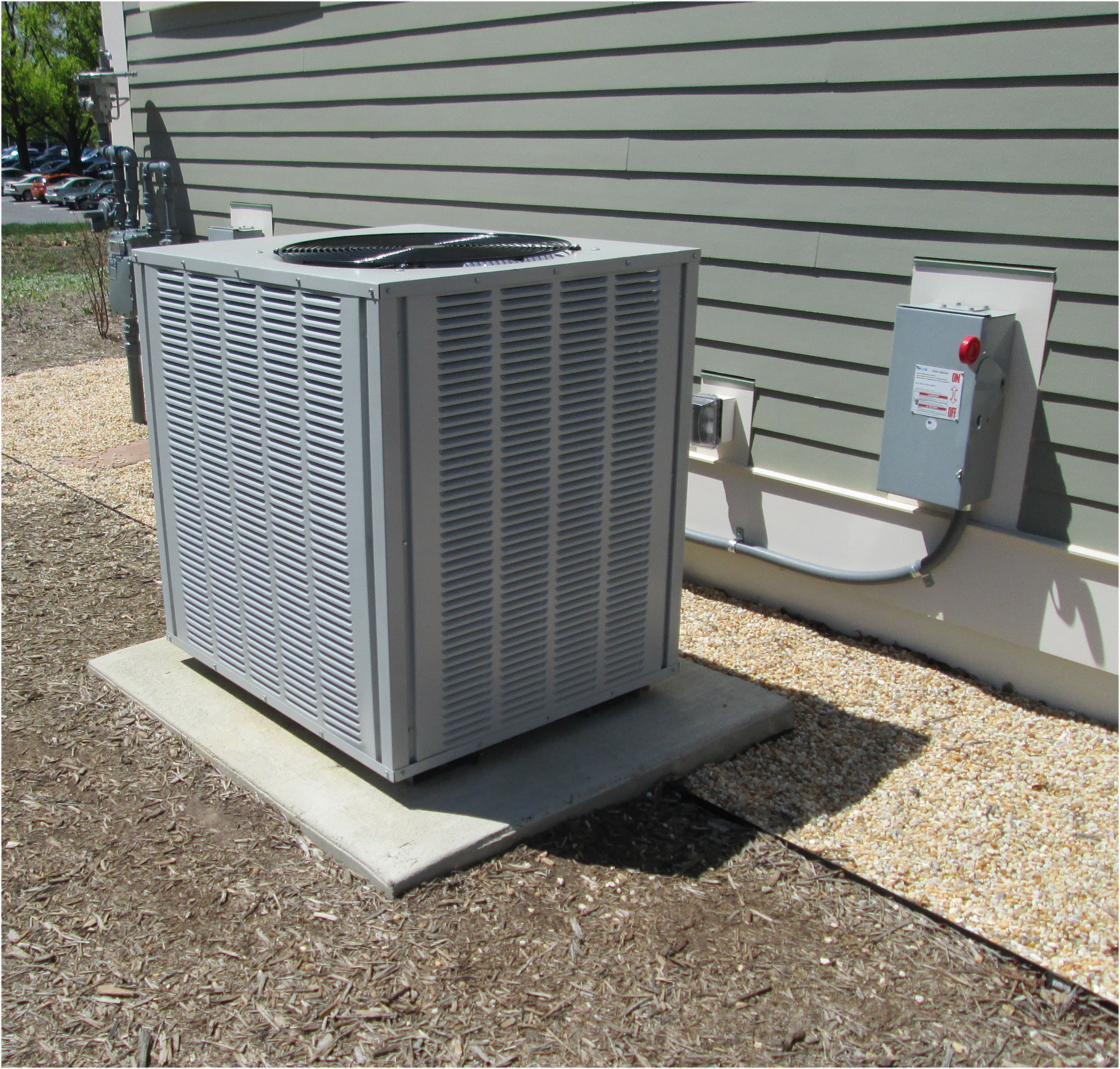 Outdoor condenser, lifestyle stock. Not a Year Round Filters product photo.